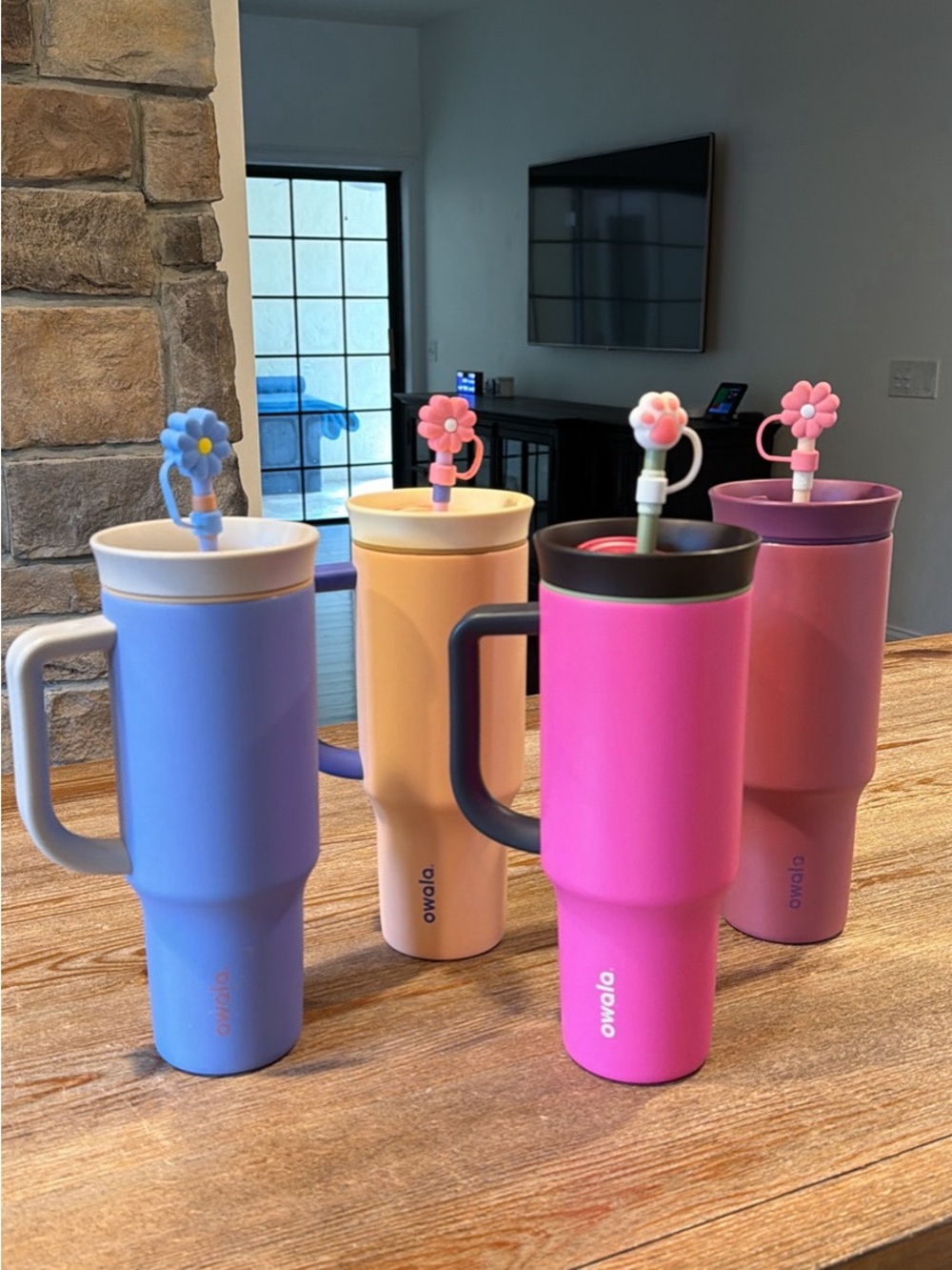 4 large 40 oz Insulated owala water bottle tumblers in Blue, Peach, Pink, Rose